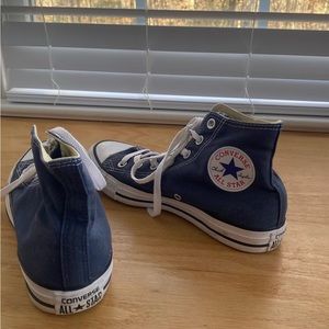 navy blue high top converse